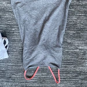 Adorable gray tank with hot pink cross cross back